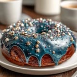 A galaxy graduation cake with shimmering edible stars, perfect for celebrating academic milestones.  