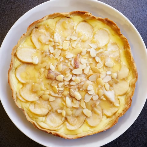 Golden Rustic Crustless Apple Pie, with tender baked apples in a creamy, spiced custard.