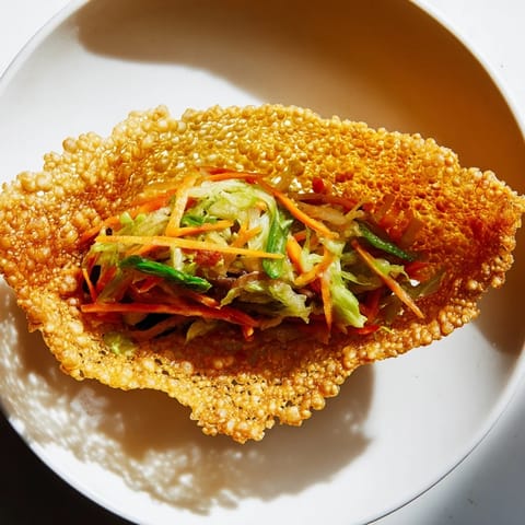 Crunchy fried Crispy Rice Paper Dumplings, served with dipping sauce, offering a satisfying bite.