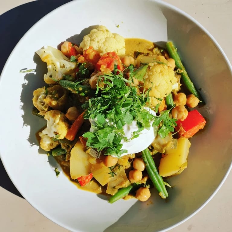 Enjoy a steaming bowl of Waste-Free Vegetarian Curry, perfect for a cozy, flavorful, and plant-based dinner.