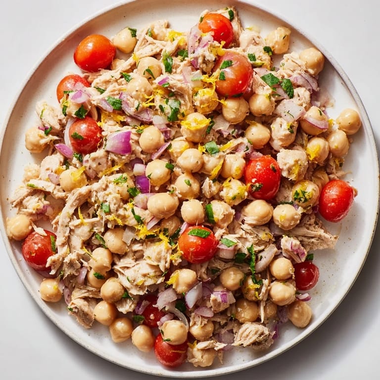 A close-up of a flavorful Dense Chickpea and Tuna Salad, ideal for a quick, healthy lunch.
