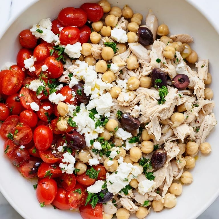 A refreshing Mediterranean Chickpea Chicken Salad served chilled, with tender chickpeas, crumbled feta, and zesty lemon-olive oil dressing for an easy lunch.